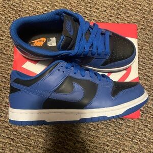 Blue and black Nike SB dunks low top